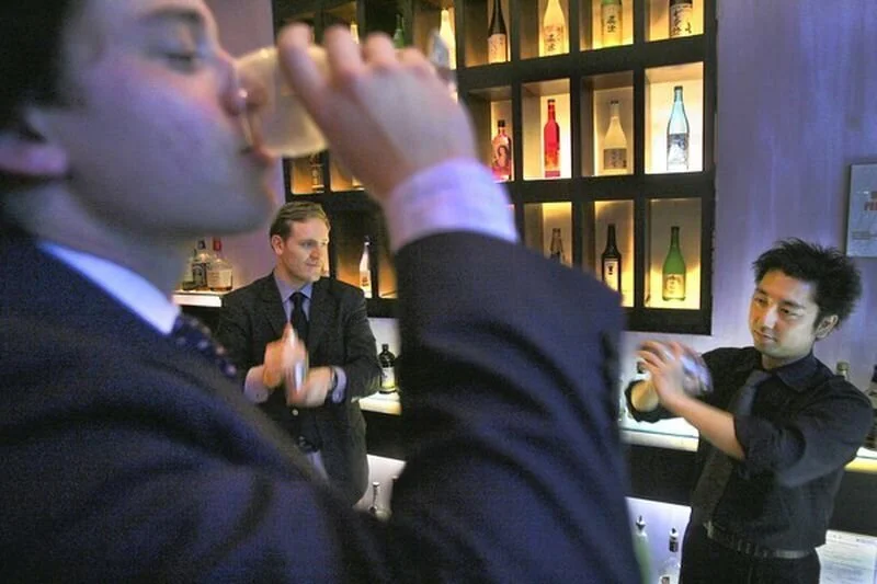  Mason Horowitz (left) and John Robinson, co-founders of Chicago Sake, hope to promote the traditional Japanese drink in Chicago with the help of Jun Takanarita, bartender at Murasaki. (2011) (Tribune photo by Charles Osgood) 
